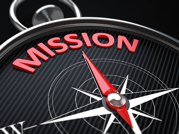3d render image. Compass needle pointing the green word mission. 3d render image. Compass needle pointing the green word mission.